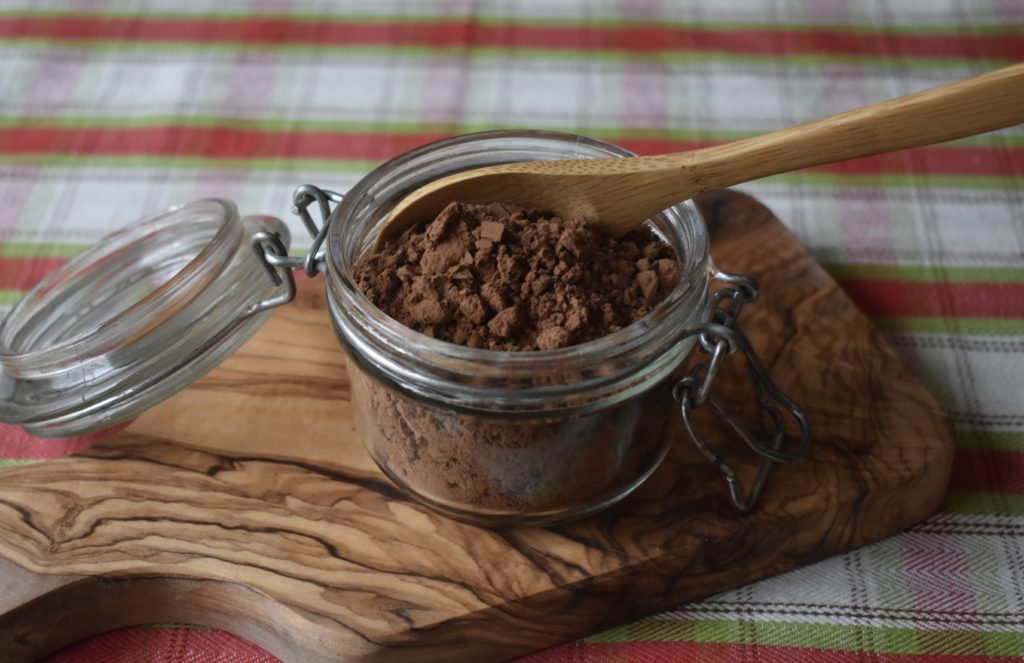Chia Cacao Collagen Smoothie. A dish of raw cacao powder.