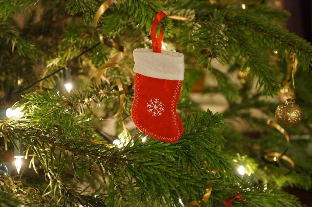 2019 Healthy Stocking Stuffer Ideas.  A little stocking hanging on the Christmas tree.