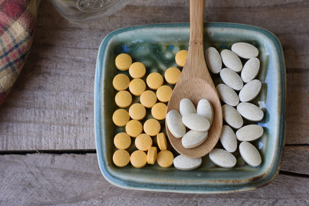 Are Dietary Supplements Necessary? Pills on a plate.