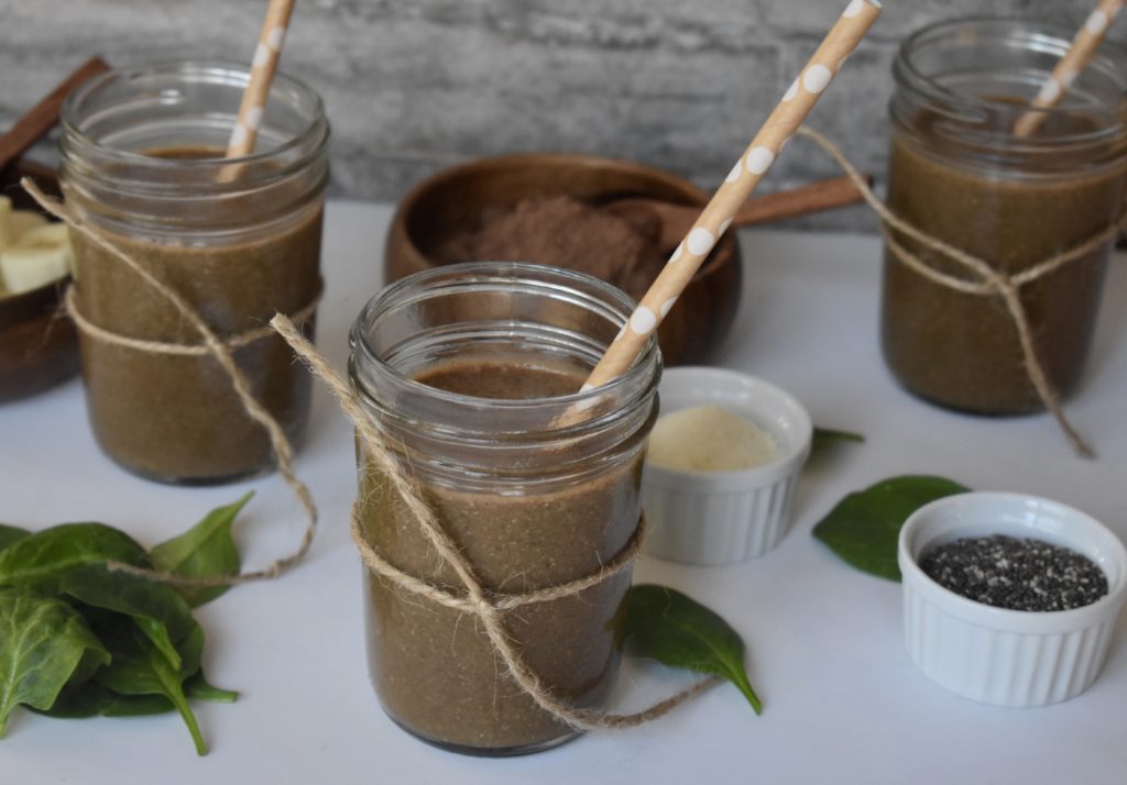 Chia Cacao Collagen Smoothie in three glasses and ingredients.