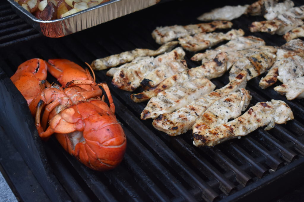 Healthy Meal Idea for Camping Trips.  Grilling lobster and chicken.