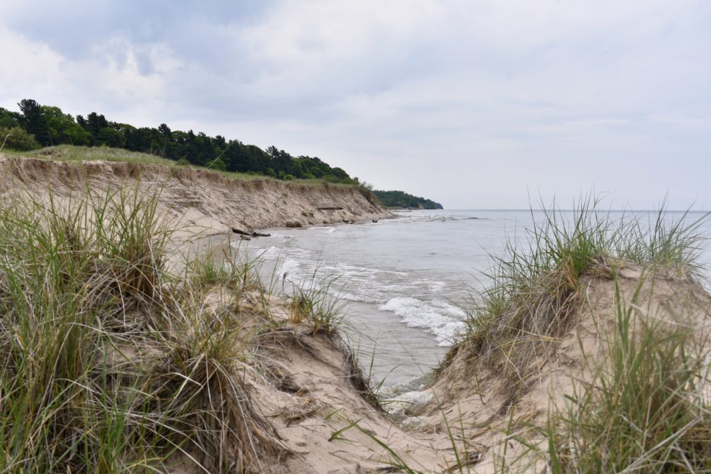 Explore Michigan Lighthouses & Sand Dunes. Shoreline of Lake Michigan.