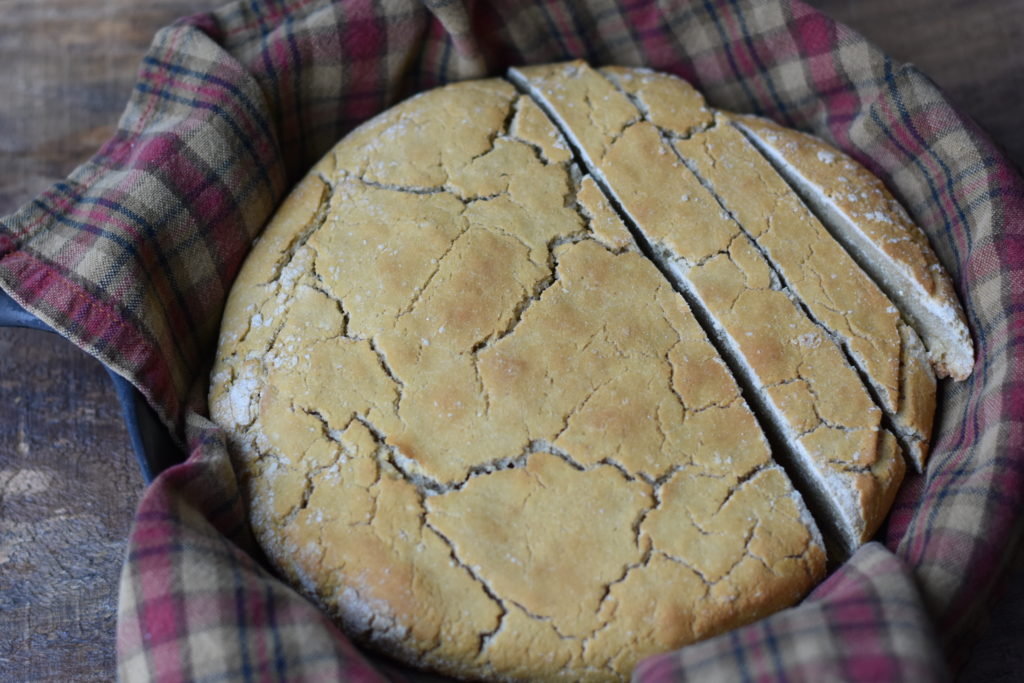 Grain Free Artisan Skillet Bread.  Sliced artisan bread in a cast iron skillet.
