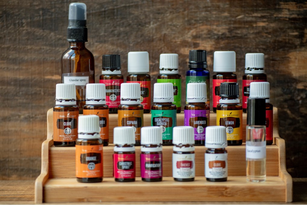 Essential oil use for teenagers.  A stand with a variety of oil scents.
