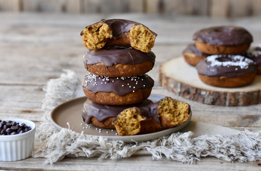 Cassava flour pumpkin doughnuts with collagen stacked on a table.