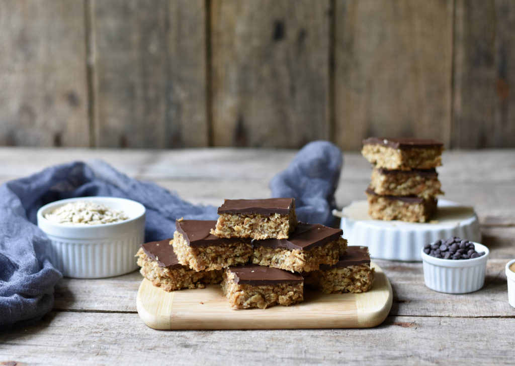 Gluten free peanut butter chewy bars with oats, chocolate chips and peanut butter.