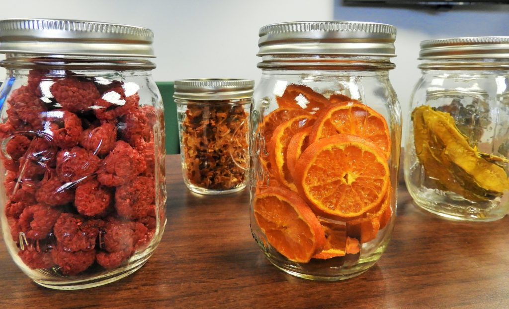 Healthy Lifestyle Holiday Gift Guide with dehydrated food in jars.