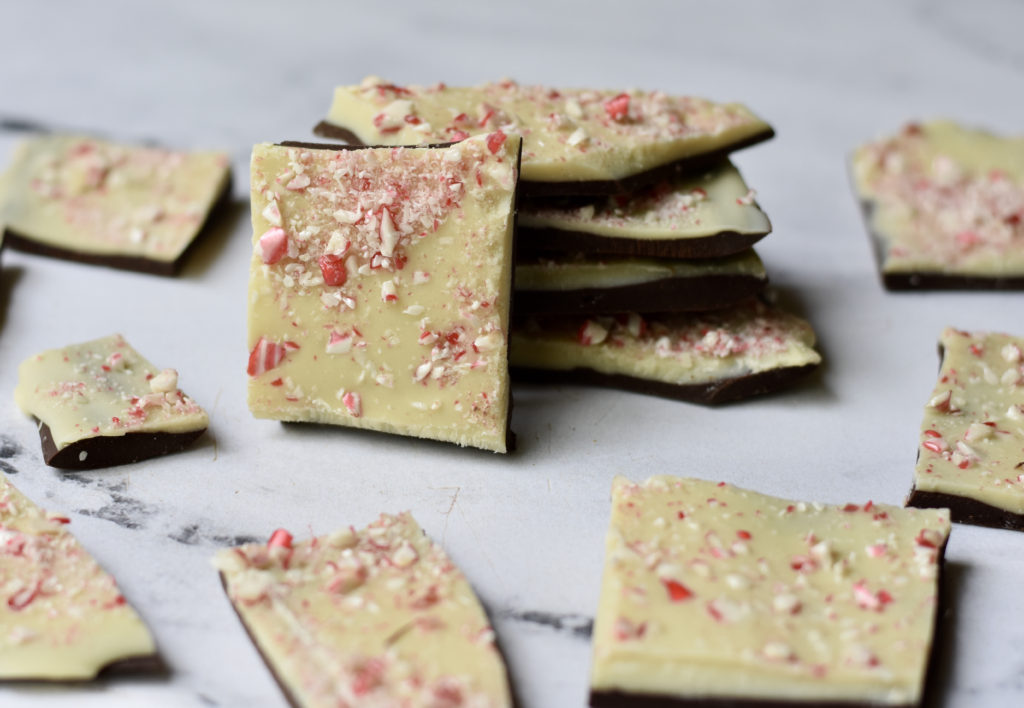 gluten free white chocolate peppermint bark on a white countertop.