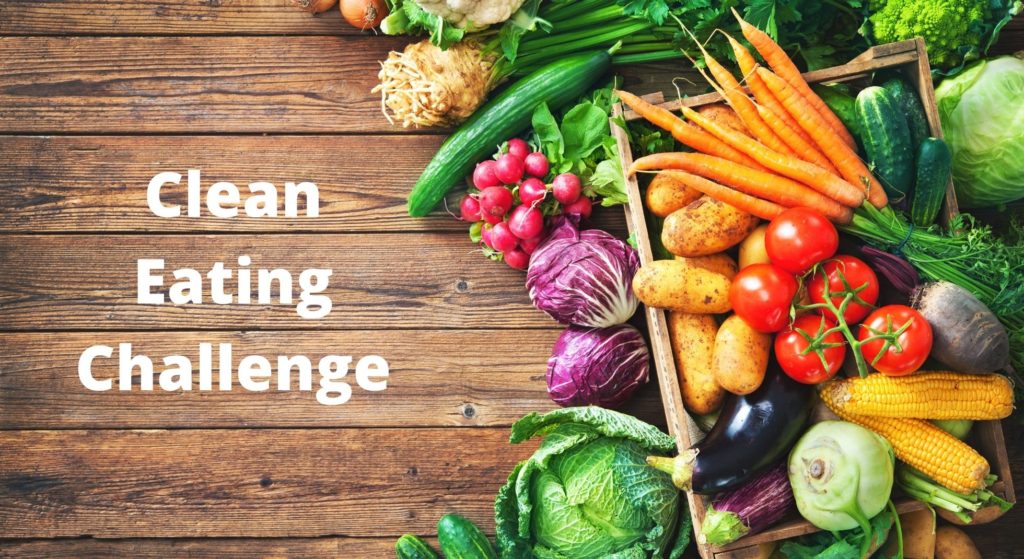 Clean Eating Challenge with fresh vegetables in colors of red, yellow, orange, and green.