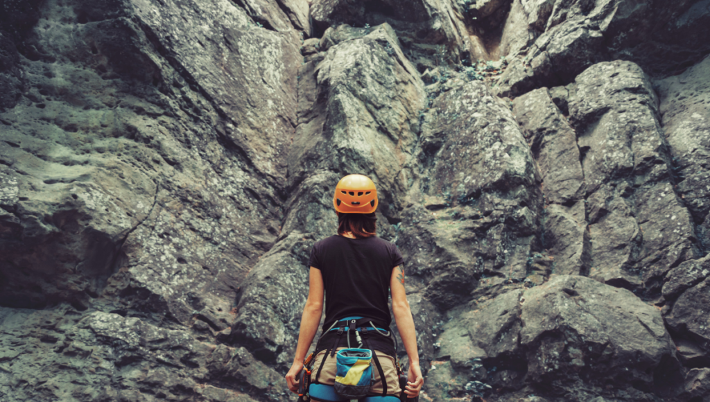 Healthy outdoor warm weather activities include rock climbing.
