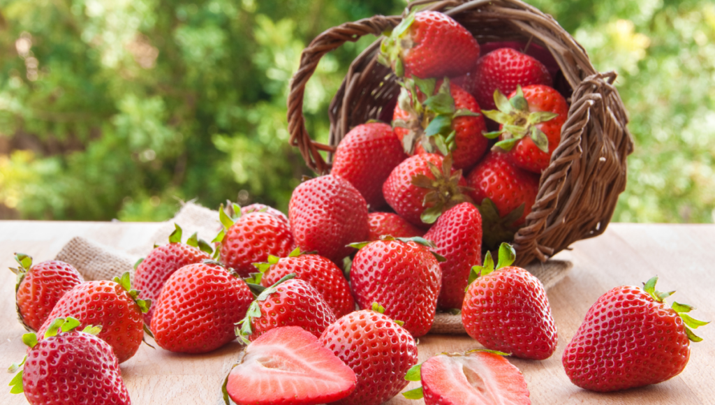 Improve your health with nutritious berries.  A small basket of strawberries on it's side.